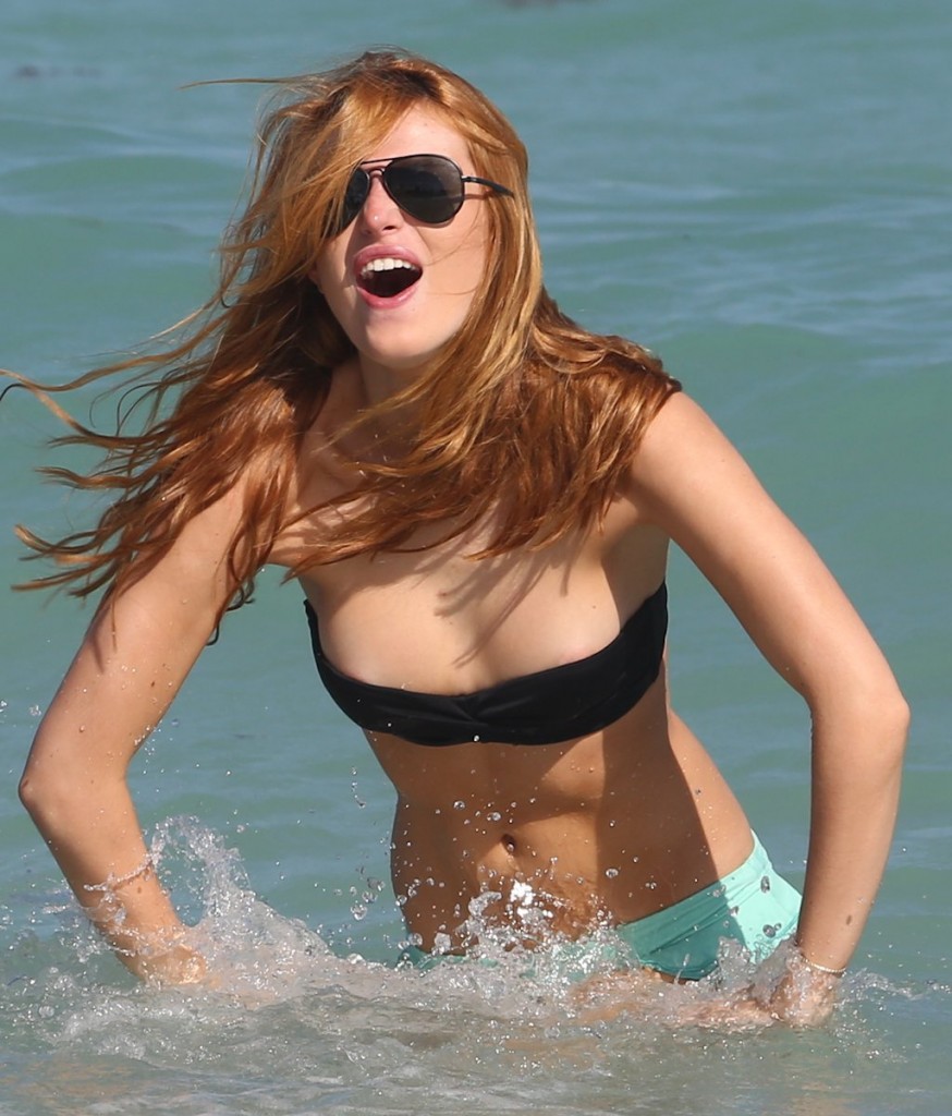 Bella-Thorne-Half-Nude-Enjoys-in-the-Sea